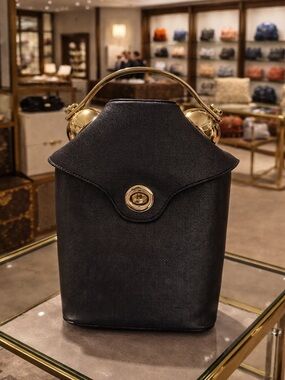 Structured Black Crossbody Bag with Gold Accents